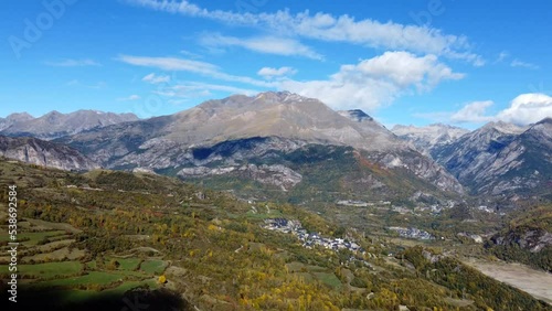 Aerial view of the beech forest of Betato, during autumn and the mountains of the Pyrenees (Piedrafita) Aragon, Spain.