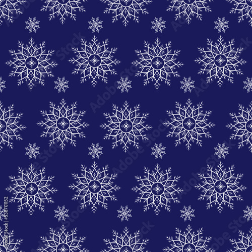 Vector pattern with snowflakes on a blue background. Seamless pattern for New Year and Christmas. Suitable for background and wrapping paper  fabric in winter version. Vintage decorative elements.