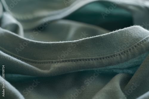Closeup teal cotton fabric for clothes photo