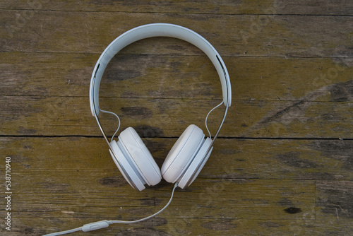 headphones on wooden background