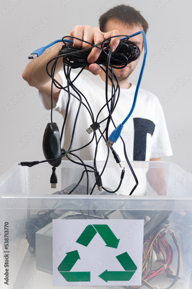 Hazardous EWaste Recycling. Household electrical and scrapped electronic devices in recycle box