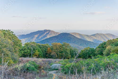 View of Blue Ridge Mountains from a meadow in Shenandoah National Park during the Fall.