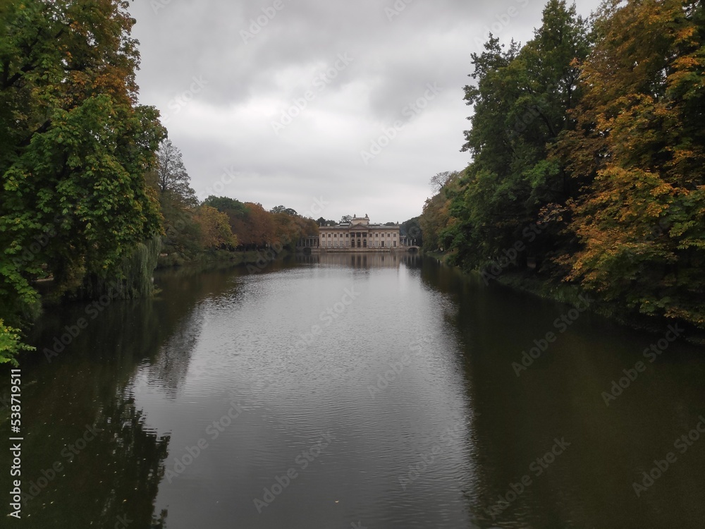 River with palace in Warsaw Poland Łazienki Królewskie