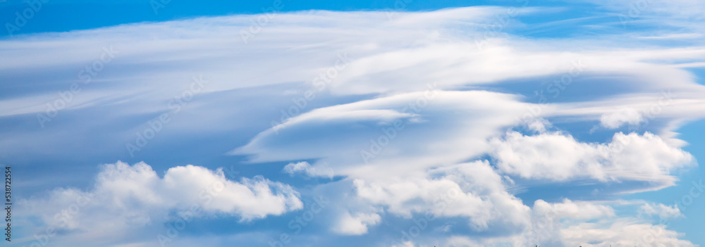 Beautiful sunny blue sky background with white clouds. Amazing nature background Beautiful sunny blue sky background with white clouds. Amazing nature background