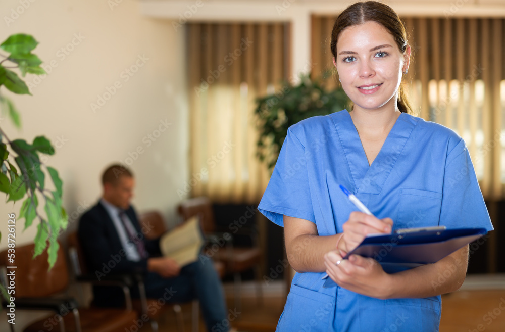 Woman doctor wear white medical uniform with folder of documents in