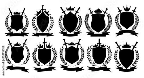 Heraldic royal emblem set with kings crown, shield, sword, laurel wreath, ribbon. Different shape black glyph symbol. Kingdom victory leaderships trophy cups. Best choice symbol. Championship signs