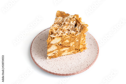Traditional lithuanian cake shakotis isolated on white, side view, close up.