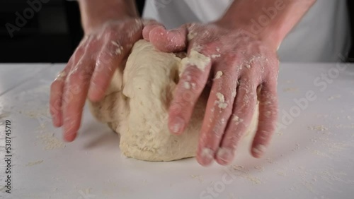 dough kneading for bread photo