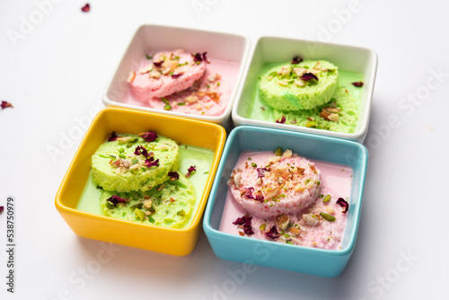 Bread Rasmalai, tweaked version of Ras malai using bread slices in Rose and pistachio flavours © StockImageFactory