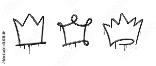 collection of Spray painted graffiti crown sign in black over white.
