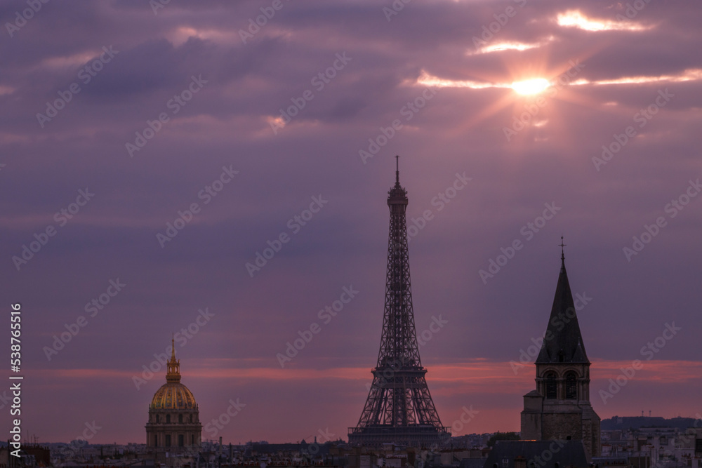 Eiffel tower and Les Invalides at golden sunset, Paris cityscape, France