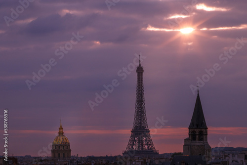 Eiffel tower and Les Invalides at golden sunset  Paris cityscape  France
