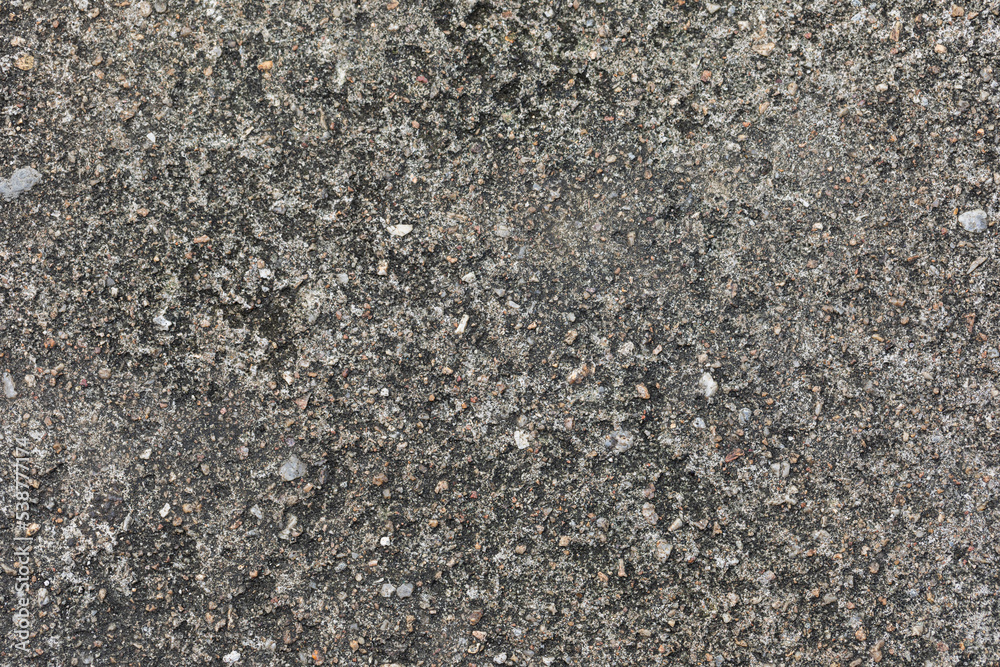 Gray textured cement wall background with fine concrete chips. Construction backgrounds Gray textured cement wall background with fine concrete chips. Construction backgrounds