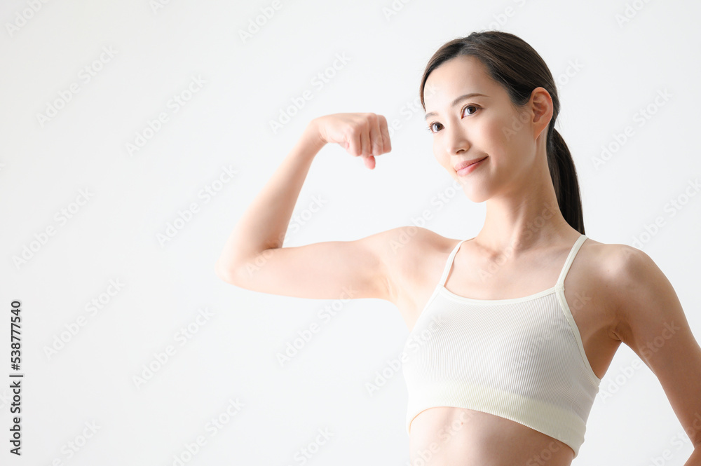 筋トレなどをする美しいアジア人女性 筋トレなどをする美しいアジア人女性