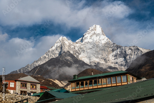 Pangboche, Nepal: Tea house lodges in the Pangboche village along the Everest base camp trek with the stunning Ama Dablam peak in the Himalaya in Nepal photo