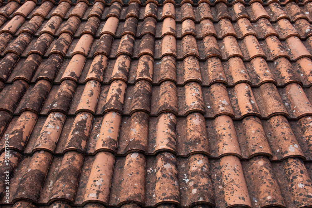 Old red terracotta roof tiles. Texture. Background pattern. Abstract. Old red terracotta roof tiles. Texture. Background pattern. Abstract.
