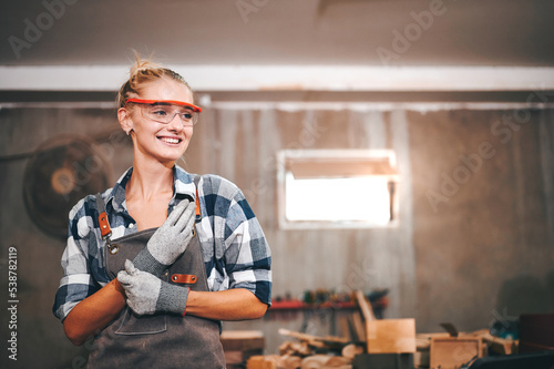 Carpenter woman standing smile.