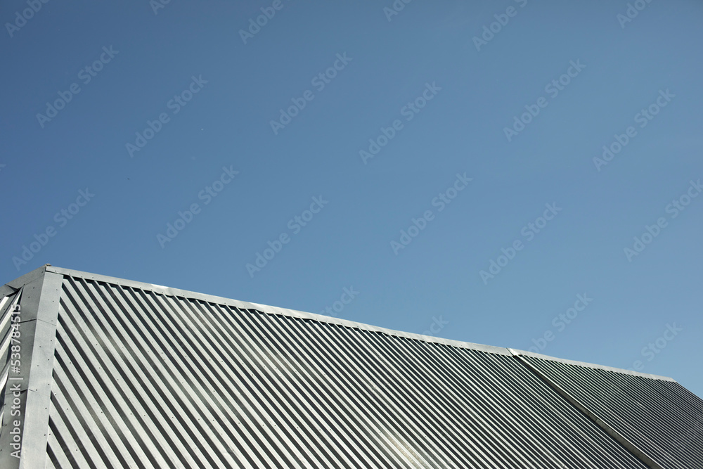 Roof is made of metal. Steel roof. Details of building. Roof is made of metal. Steel roof. Details of building.