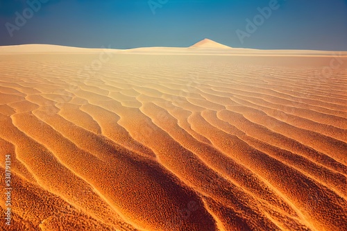 Dry desert landscape. Hot lifeless sand of desert and blue sky in summer sunny day. Flat desert of Egypt. Travel and tourism concept.