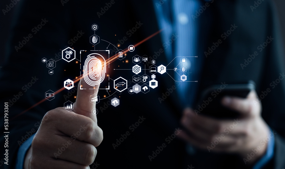 Businessman using fingerprint to access personal financial information ...