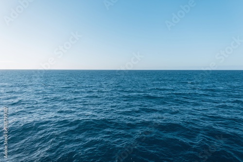 Wallpaper Mural Beautiful views of blue clear water with waves and a clear horizon. Travel and summer vacation. Sea, water and sky Torontodigital.ca