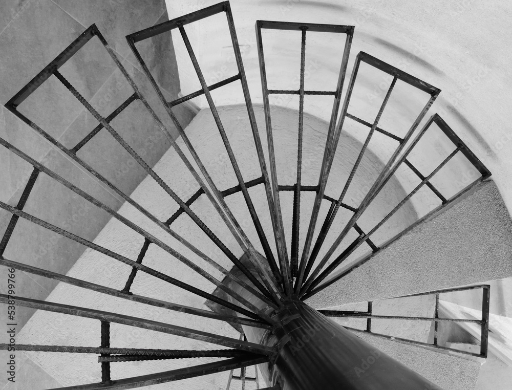 Fototapeta premium spiral staircase under construction, structure, black and white photography