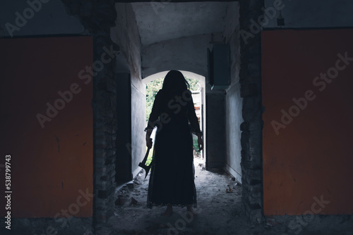 Scary ghost woman in haunted house © erika8213