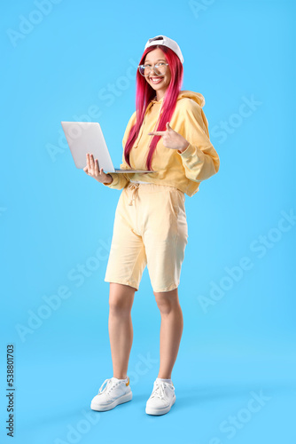 Young female student with b...