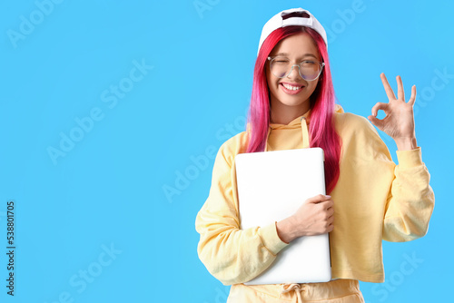 Young female student with b...