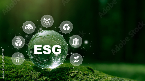 ESG icon concept on crystal globe for environmental, social, and governance in sustainable and ethical business on the Network connection on a green background.