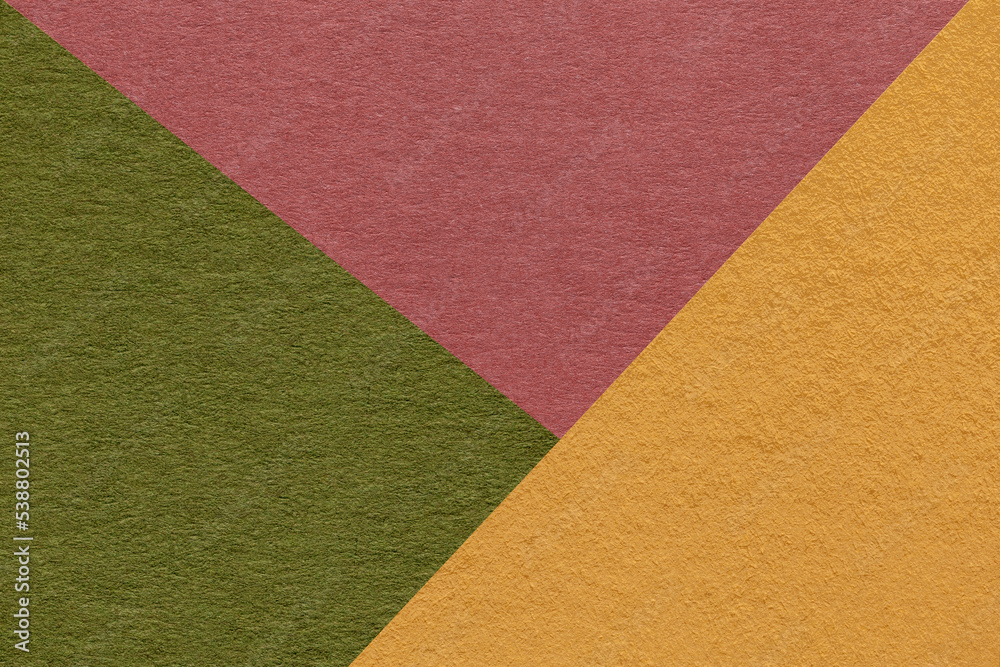 Texture of craft yellow, green and rose shade color paper background, macro. Vintage abstract cardboard Texture of craft yellow, green and rose shade color paper background, macro. Vintage abstract cardboard