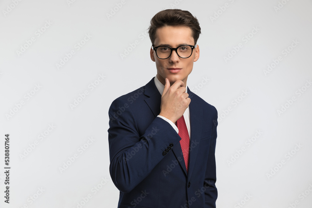 pensive elegant man in suit having work related thoughts pensive elegant man in suit having work related thoughts