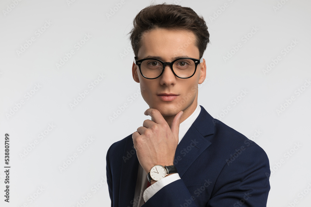 close up picture of thoughtful businessman with eyeglasses thinking close up picture of thoughtful businessman with eyeglasses thinking