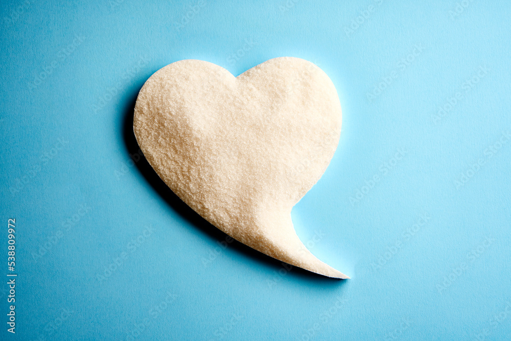 Fototapeta premium Diabetes concept with sugar heart speech bubble