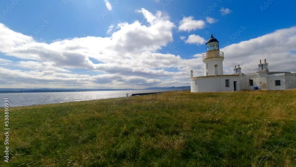 A timelapse of a very beautiful place in Scotland showing cloud movement across the small lighthouse. This is a popular place for dolphin watching and attracts enthusiasts worldwide. A timelapse of a very beautiful place in Scotland showing cloud movement across the small lighthouse. This is a popular place for dolphin watching and attracts enthusiasts worldwide.