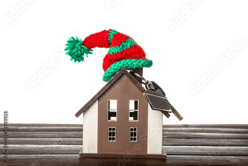 House model with hat on tab...