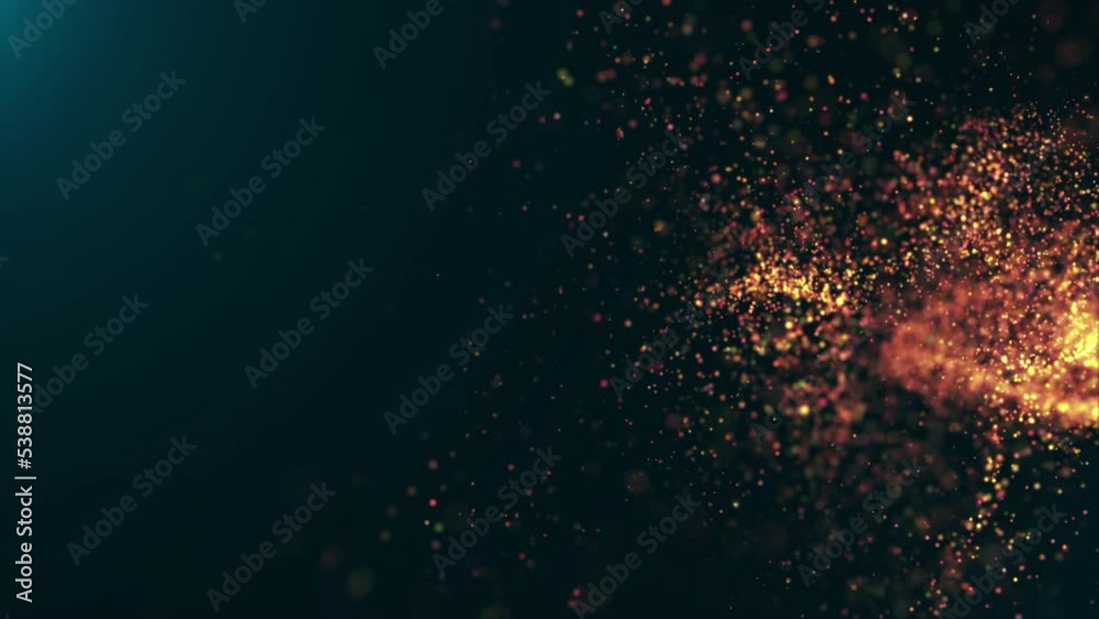 Lively abstract background with lots of bright orange particles in motion on a dark blue background 4k animation.