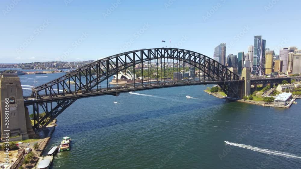 Aerial drone view of Sydney Harbour Bridge in Sydney, NSW Australia on a sunny day Aerial drone view of Sydney Harbour Bridge in Sydney, NSW Australia on a sunny day