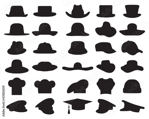 Billede på lærred Black silhouettes of various caps and hats on a white background