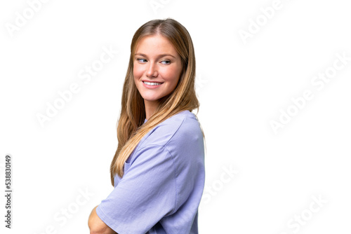 Young beautiful woman over isolated background with arms crossed and happy