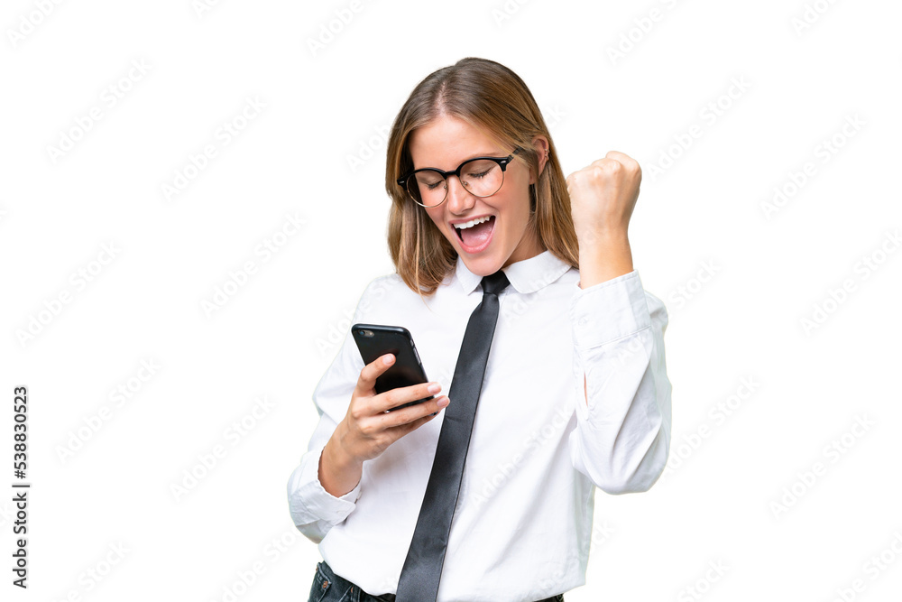 Young business caucasian woman over isolated background with phone in victory position