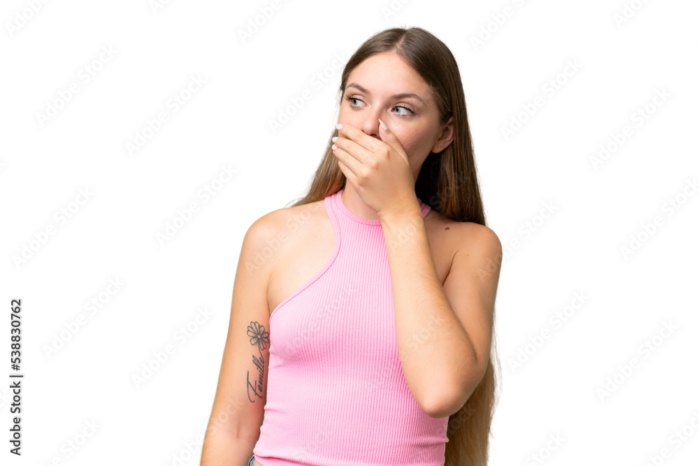 Young beautiful blonde woman over isolated background doing surprise gesture while looking to the side Young beautiful blonde woman over isolated background doing surprise gesture while looking to the side