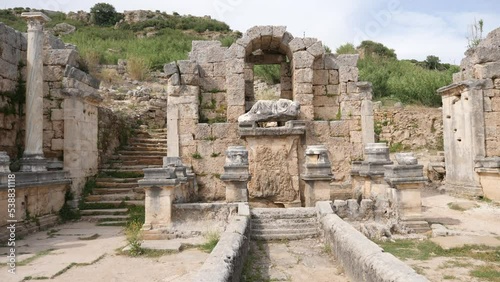 Nymphaeum of Perge. Ruins of ancient Pamphylian city located in Antalya Province, Turkey. Statue of Kestros, river god. photo