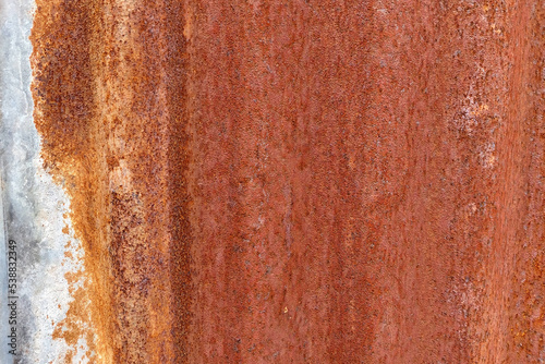 Old rusty zinc wall. Rusty style metal sheet roof texture. Background and texture in vintage concept. Retro metal textured (ID: 538832349)