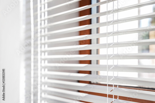 Adjusting vertical or venetian blinds. Design for adjust, close or open. close up