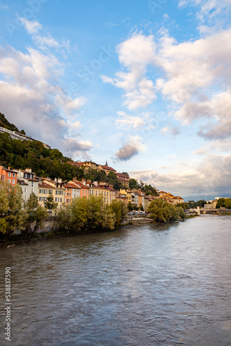 A riverside street in Grenoble with cloudy during the afternoon time