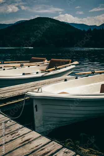 Boats moored on Monticolo Lake photo