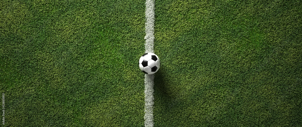 Obraz premium Football on the ground