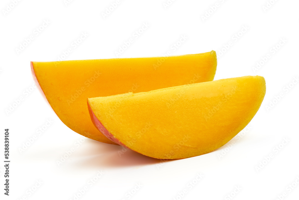 Juicy ripe Mango fruit slices, close-up, isolated on white background. Juicy ripe Mango fruit slices, close-up, isolated on white background.