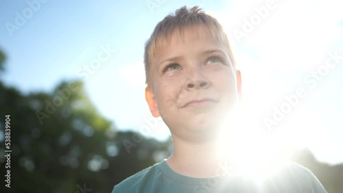 Wallpaper Mural little boy portrait in the park. close-up a kid child in nature. happy family kid concept. happy sunlight girl close-up smiling. cheerful little boy portrait. child outdoors nature in the park Torontodigital.ca